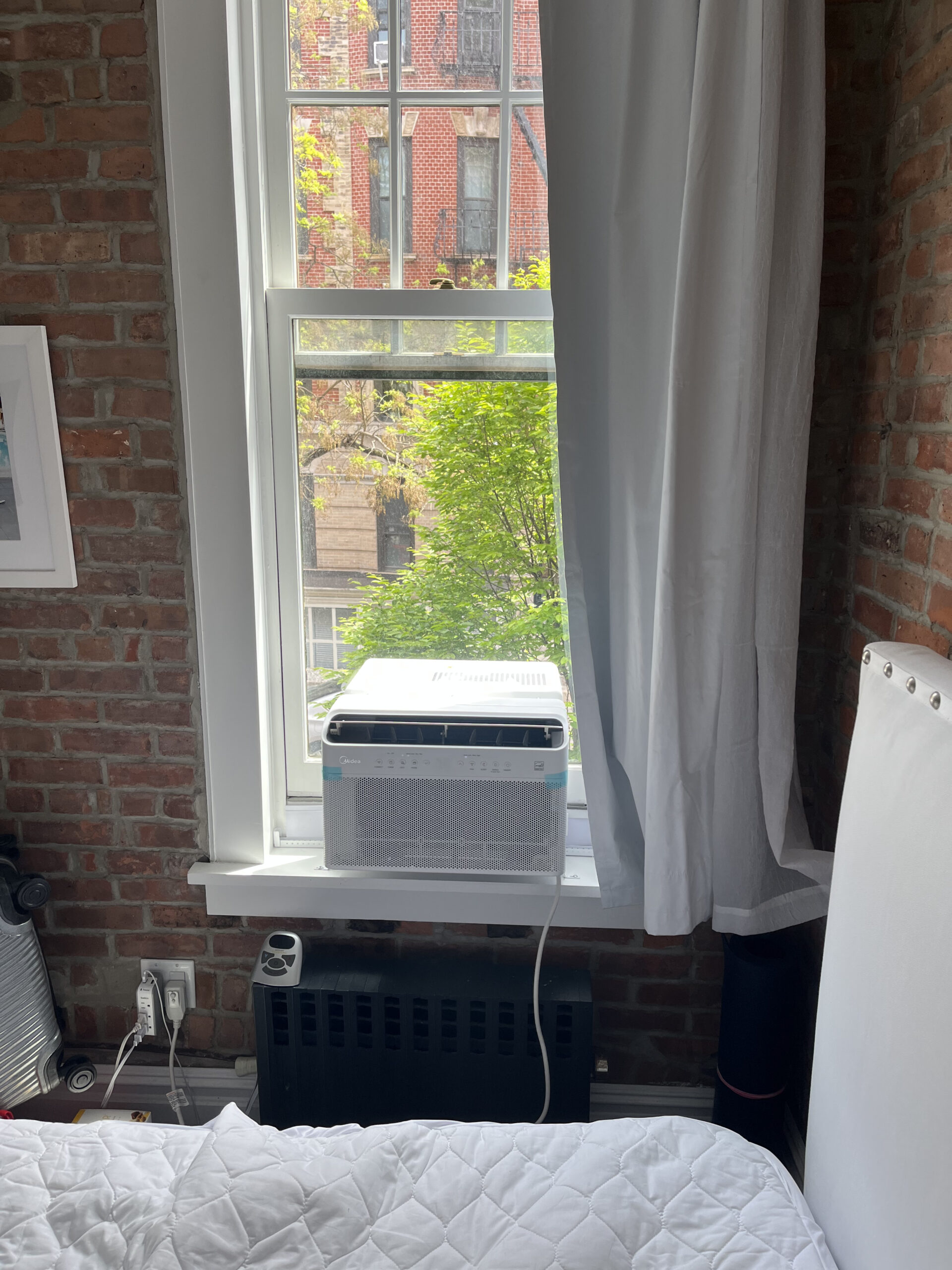 Safe and secure window AC bracket setup