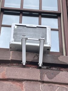 window AC bracket installation NYC exterior support for air conditioner